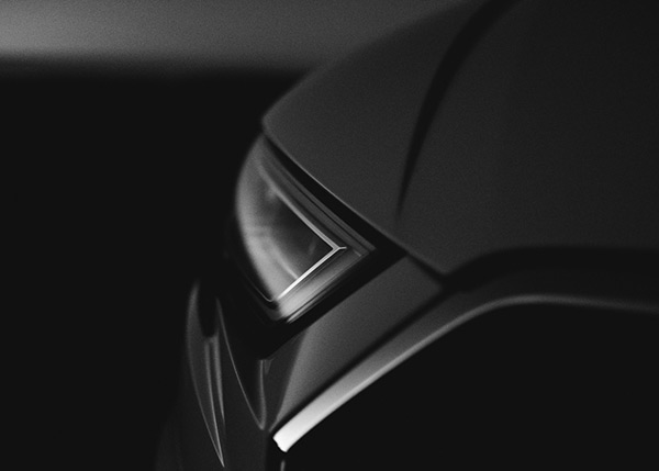 Close-up of a modern car headlight, representing the automotive sector served by BRP Spruce Pine